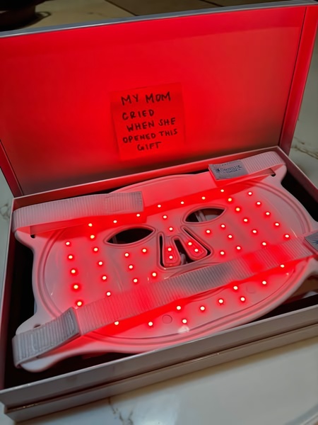 led face mask, light therapy device, facial treatment mask, red light therapy, skincare device, beauty mask, led therapy mask, product launch, minimalist, playful, warm, red, mother's day