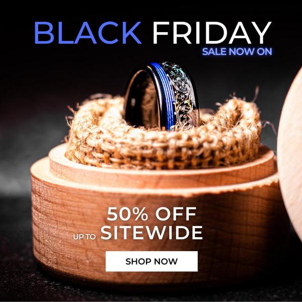 A high-end ring sitting in a wooden box on a dark background, advertising a 50% discount for a Black Friday site-wide promotion.
