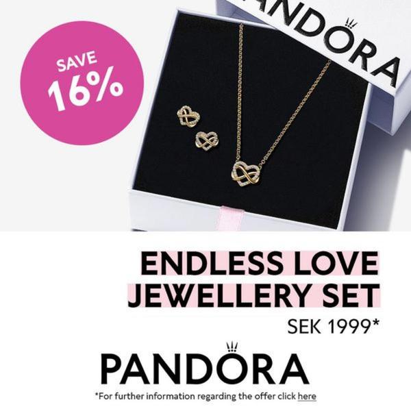 A clean, high-contrast promotional creative featuring an infinity heart jewellery set within its premium packaging with a bold percentage-off callout.