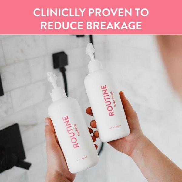 A close-up, high-contrast shot of hands holding shampoo and conditioner bottles against a clean bathroom backdrop with a direct text overlay.
