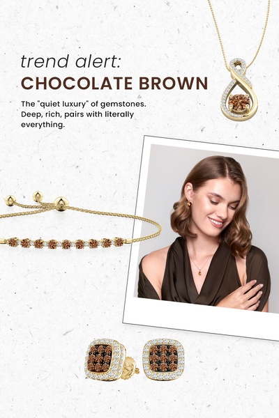 A refined product hero shot featuring a necklace, bracelet, and earrings in chocolate brown gemstone settings. The creative utilizes a clean, editorial look to emphasize quiet luxury.