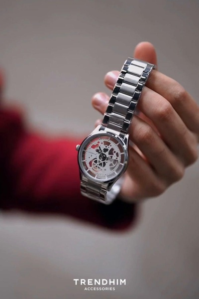 wrist watch, metal watch, skeleton watch, analog watch, stainless steel watch, dress watch, bestseller push, brand awareness, lifestyle, minimalist, luxurious, trustworthy, neutral, brown