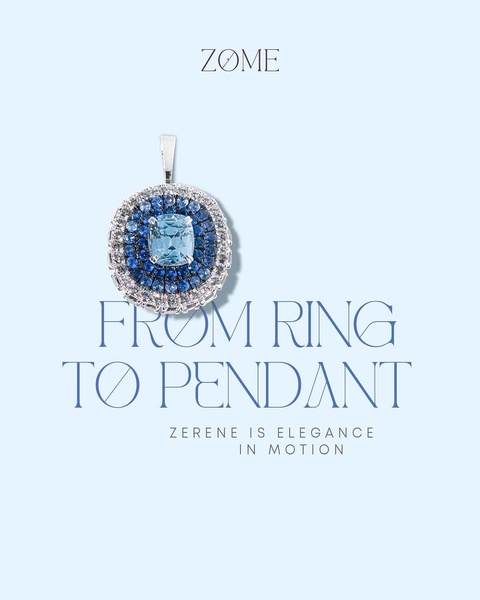 A high-end jewelry advertisement featuring a single pendant centered on a soft blue background, emphasizing elegance and motion.