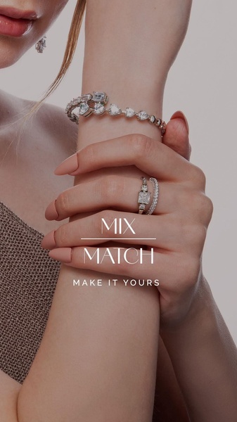 A close-up vertical shot focusing on layered rings and a bracelet, emphasizing a clean and high-end aesthetic for jewelry.