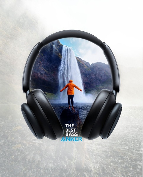 A high-concept creative featuring black over-ear headphones framing a scenic waterfall and a person in a bright orange jacket.