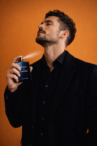 cologne, men's fragrance, perfume, eau de parfum, scent, brand awareness, lifestyle, editorial, luxurious, bold, orange, black