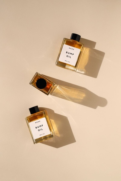 body oil, skincare oil, massage oil, stretch mark oil, pregnancy skin care, bestseller push, minimalist, flat lay, calm, luxurious, neutral, brown