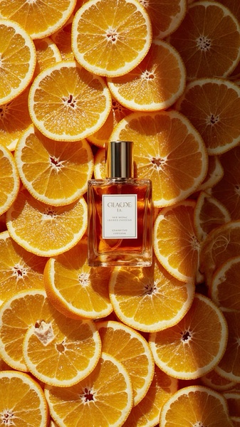 perfume, cologne, fragrance, scent, eau de parfum, brand awareness, flat lay, fresh, luxurious, orange, yellow