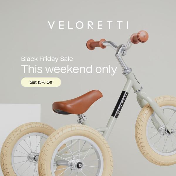 A clean, high-contrast creative highlighting a seasonal Black Friday discount for a balance bike, using neutral tones and simple typography.