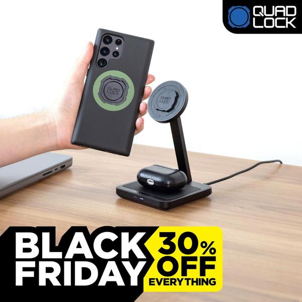 A clean, studio-lit image of a wireless charger with a handheld phone, promoting a sitewide 30% discount for Black Friday.