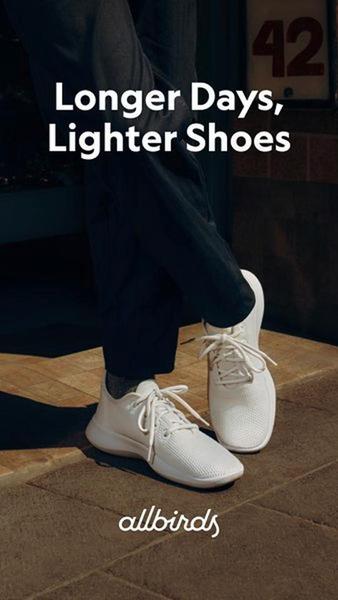 A vertical 9:16 ad creative featuring a close-up of a model wearing white sneakers in an urban setting with a seasonal copy hook.