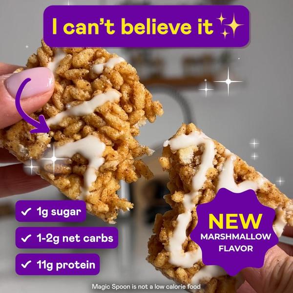 This creative showcases a Marshmallow snack bar being pulled apart to reveal texture, supported by clear nutritional benefit badges and a punchy, high-energy headline.