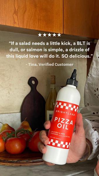 A close-up shot of a customer holding a branded bottle of spicy oil, overlaid with a five-star review emphasizing culinary utility.