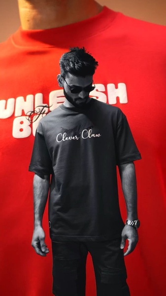 t-shirt, graphic tee, crewneck shirt, short sleeve tee, cotton t-shirt, brand awareness, editorial, bold, energetic, red, black