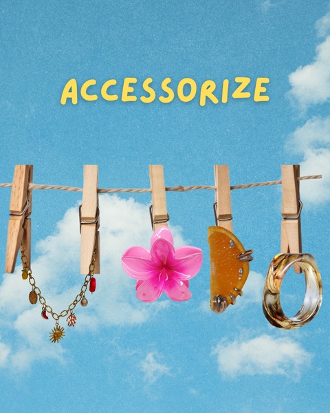 A creative product arrangement featuring jewelry and hair accessories clipped to a clothesline against a bright, clear blue sky.