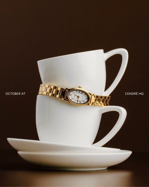 gold watch, wrist watch, analog watch, dress watch, metal watch, brand awareness, minimalist, editorial, luxurious, calm, neutral, gold