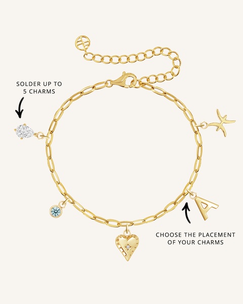 A high-clarity 4:5 creative showing a gold charm bracelet with clear callout annotations that explain the customization and placement options available to the customer.