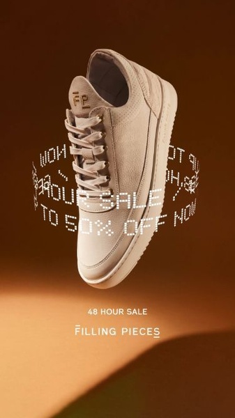 This ad creative features a singular running shoe suspended in mid-air, surrounded by a circular text overlay highlighting a 50% off flash sale event.