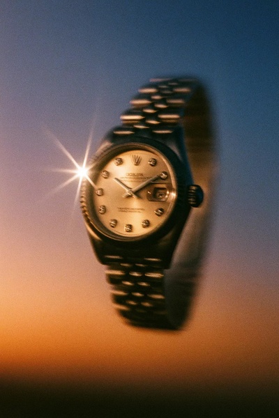 luxury watch, wrist watch, metal watch, analog watch, dress watch, brand awareness, editorial, luxurious, calm, purple, orange, blue