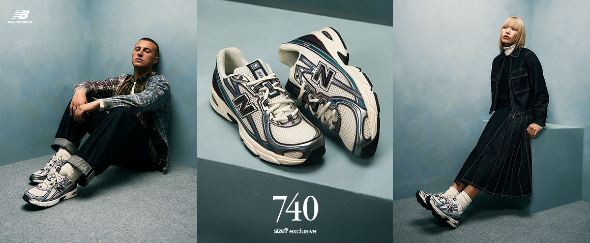 A high-end, 21:9 widescreen creative showcasing a running shoe centered between two models in a minimalist, muted-tone studio setting.