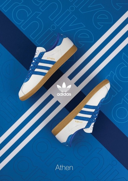 This ad creative displays two sneakers in a symmetrical, angled composition against a bold blue background with subtle typographic patterns.