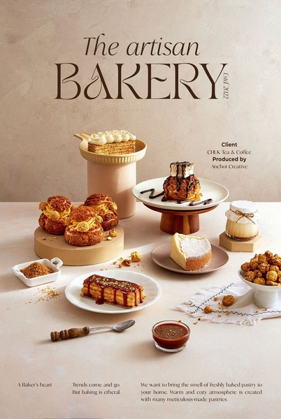 A high-end, editorial-style product photography shot featuring an assortment of artisanal pastries, cream puffs, and tarts on a neutral, warm-toned studio background.