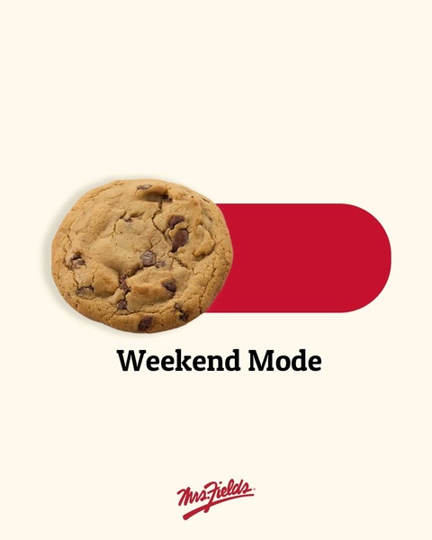 A minimalist ad featuring a single chocolate chip cookie paired with a red toggle switch, symbolizing the transition to weekend leisure.