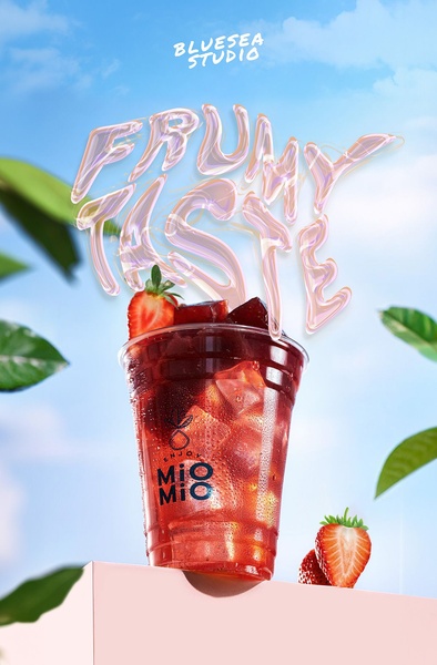 A refreshing hero shot of a strawberry iced tea drink positioned on a clean pink surface against a bright, sunny blue sky.