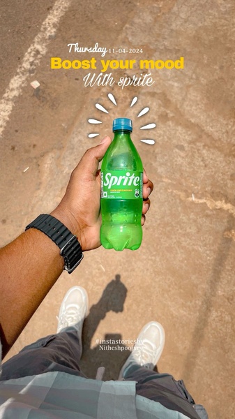 A first-person, casual perspective shot featuring a person holding a Lemon Lime Soda bottle against a sun-drenched outdoor background.