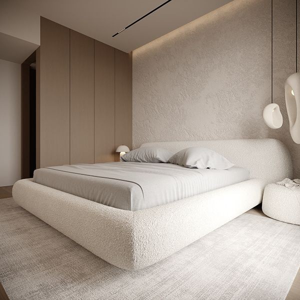 A high-end, square 1:1 image featuring a modern, textured white upholstered bed in a serene, neutral-toned bedroom setting.