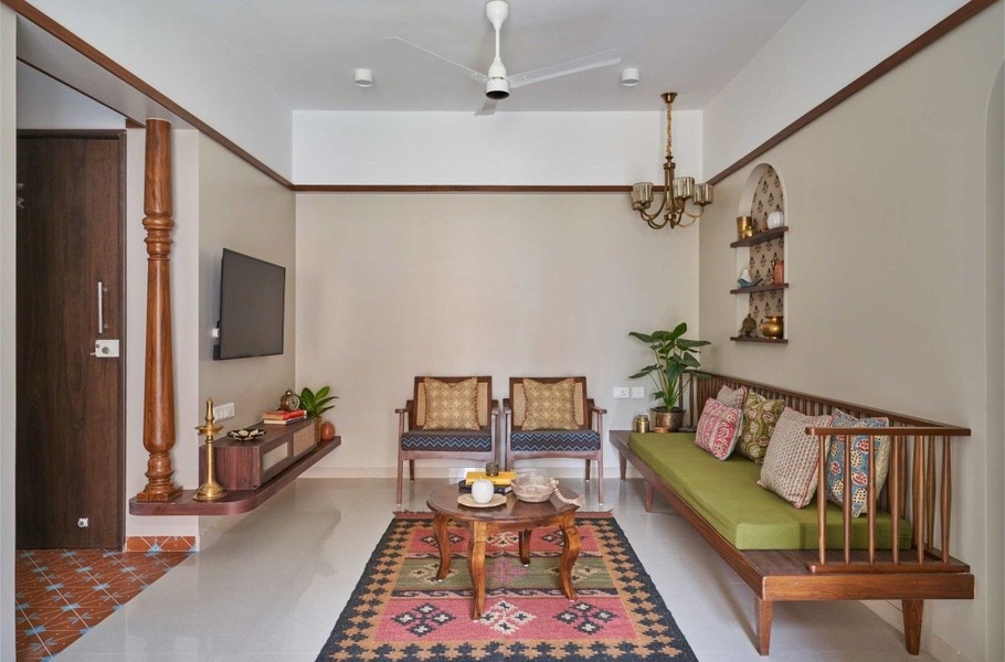 A clean, eye-level shot of a staged living room featuring wooden furniture, neutral tones, and an organized, inviting atmosphere.