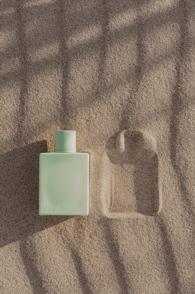 perfume bottle, cologne bottle, fragrance bottle, scent bottle, bottled perfume, brand awareness, minimalist, outdoor, calm, fresh, neutral, pastel