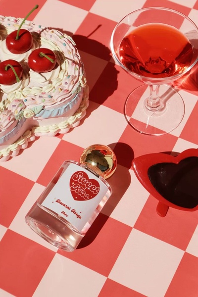 perfume, fragrance, scent, cologne, eau de parfum, brand awareness, flat lay, playful, red, pink