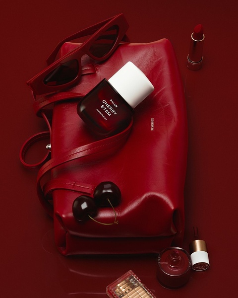 perfume, eau de parfum, fragrance, scent, cologne, brand awareness, flat lay, editorial, luxurious, bold, red