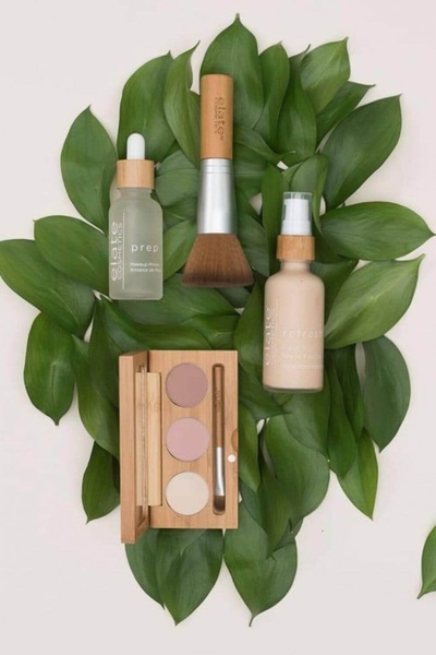 makeup primer, makeup brush, foundation, makeup palette, beauty products, brand awareness, flat lay, minimalist, fresh, calm, green, neutral