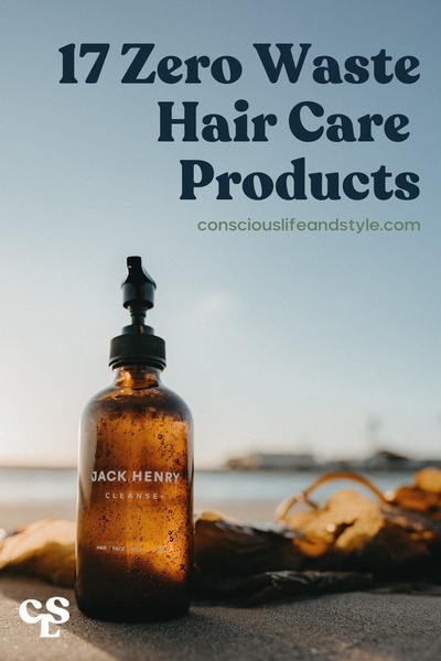 A clean, minimalist product shot of a Jack Henry bottle on a beach at sunset, emphasizing a sustainable lifestyle theme.