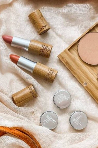 lipstick, pressed powder, cosmetic jars, makeup items, beauty products, new arrival, flat lay, minimalist, calm, fresh, neutral