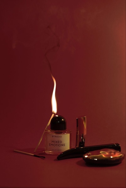 perfume bottle, eau de parfum, scent, fragrance, cologne, brand awareness, editorial, luxurious, red