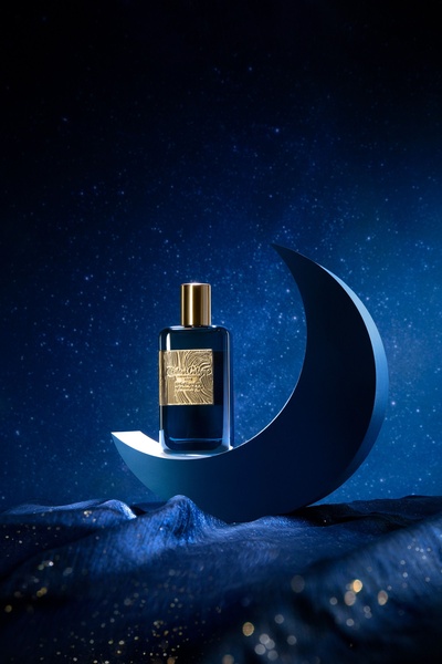 perfume bottle, cologne, fragrance, scent, eau de parfum, brand awareness, editorial, minimalist, luxurious, calm, blue, gold, neutral