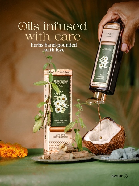 A high-quality, artisanal-style product shot showcasing Bhringraj Coconut Oil being poured, emphasizing natural ingredients and a premium brand feel.