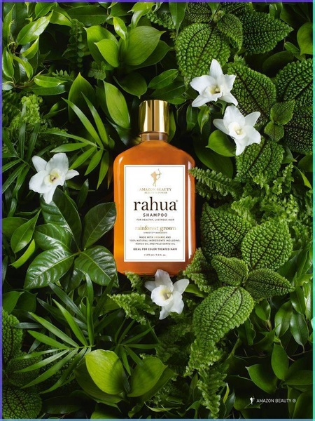A high-quality 3:4 aspect ratio static image placing the shampoo bottle in the center of lush, vibrant rainforest flora and white flowers.