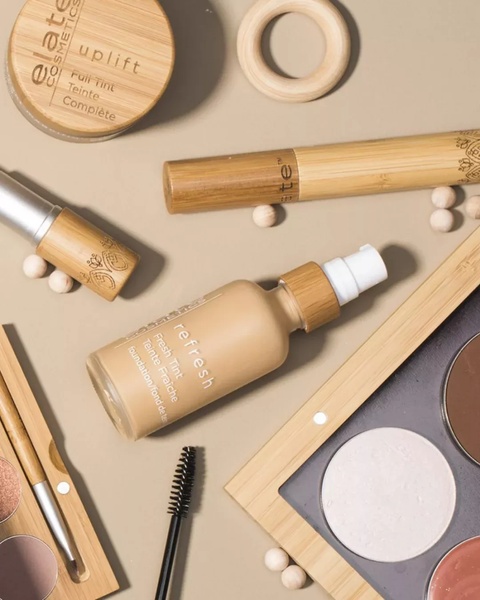 liquid foundation, face makeup, tinted moisturizer, cosmetic palette, makeup brush, beauty products, bestseller push, flat lay, minimalist, calm, trustworthy, neutral