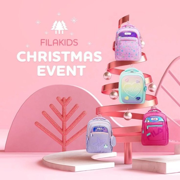 A festive, holiday-themed product display featuring four colorful kids' backpacks arranged like a Christmas tree on a pink background.