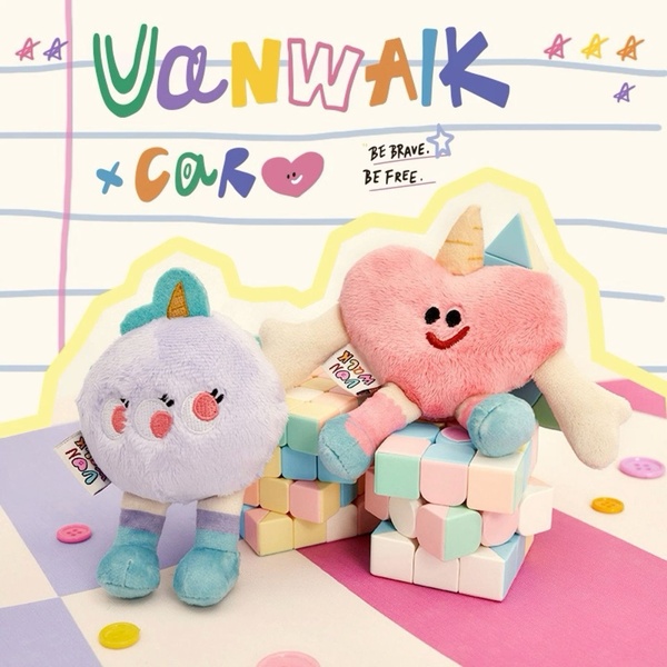 A 1:1 ratio creative featuring two quirky plush toy characters posed on a colorful, grid-paper background with playful typography.