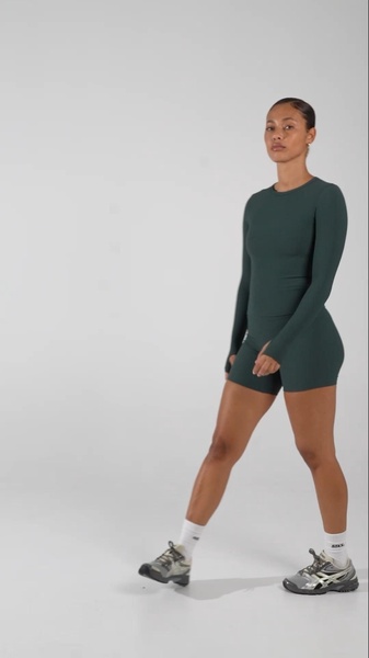 activewear set, long sleeve top, athletic shorts, workout clothing, gym wear, new arrival, minimalist, lifestyle, trustworthy, fresh, green, neutral