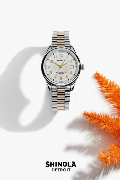 wrist watch, metal watch, analog watch, luxury watch, two tone watch, bestseller push, minimalist, luxurious, calm, neutral, orange