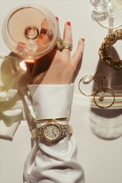 gold watch, analog watch, wrist watch, diamond watch, metal band watch, brand awareness, editorial, lifestyle, luxurious, calm, neutral, gold