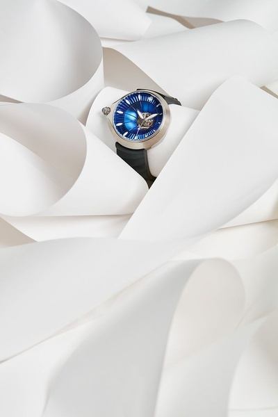 wrist watch, analog watch, luxury watch, mens watch, timepiece, brand awareness, minimalist, editorial, calm, luxurious, neutral, blue