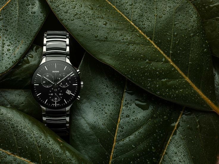 wrist watch, analog watch, luxury watch, chronograph watch, metal band watch, brand awareness, lifestyle, editorial, luxurious, calm, green, black