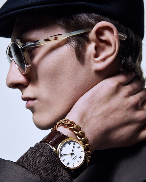 luxury watch, analog watch, leather strap watch, gold watch, designer watch, brand awareness, editorial, luxurious, bold, brown, gold, neutral